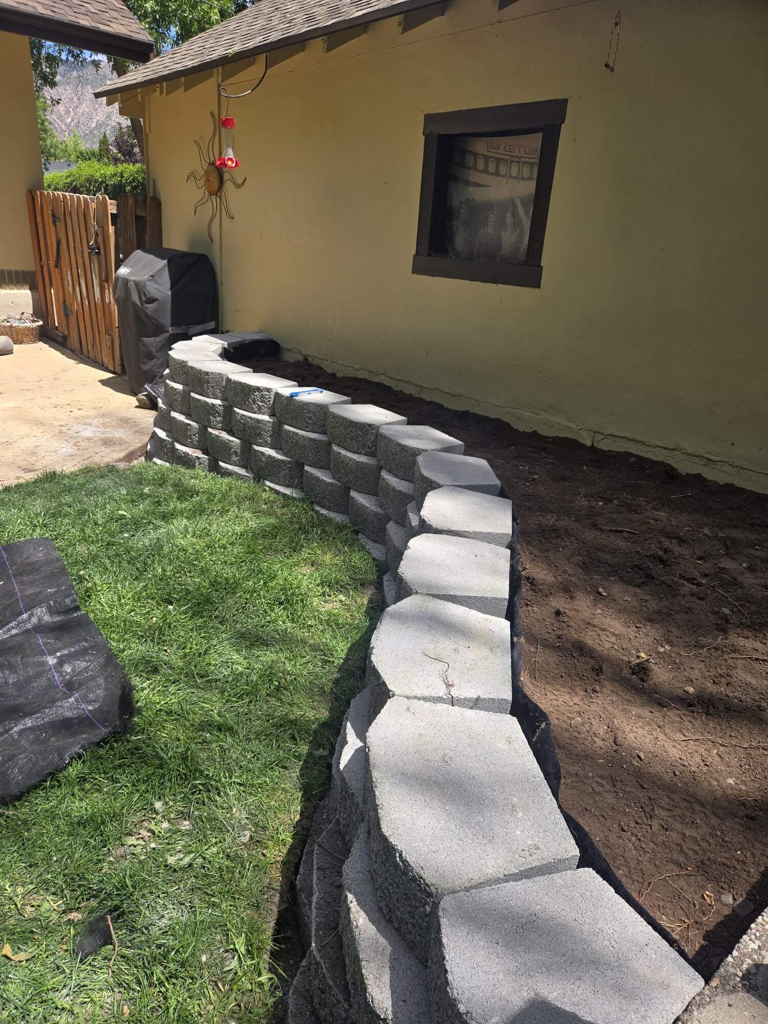 Deseret Landscaping crew finishing a retaining wall